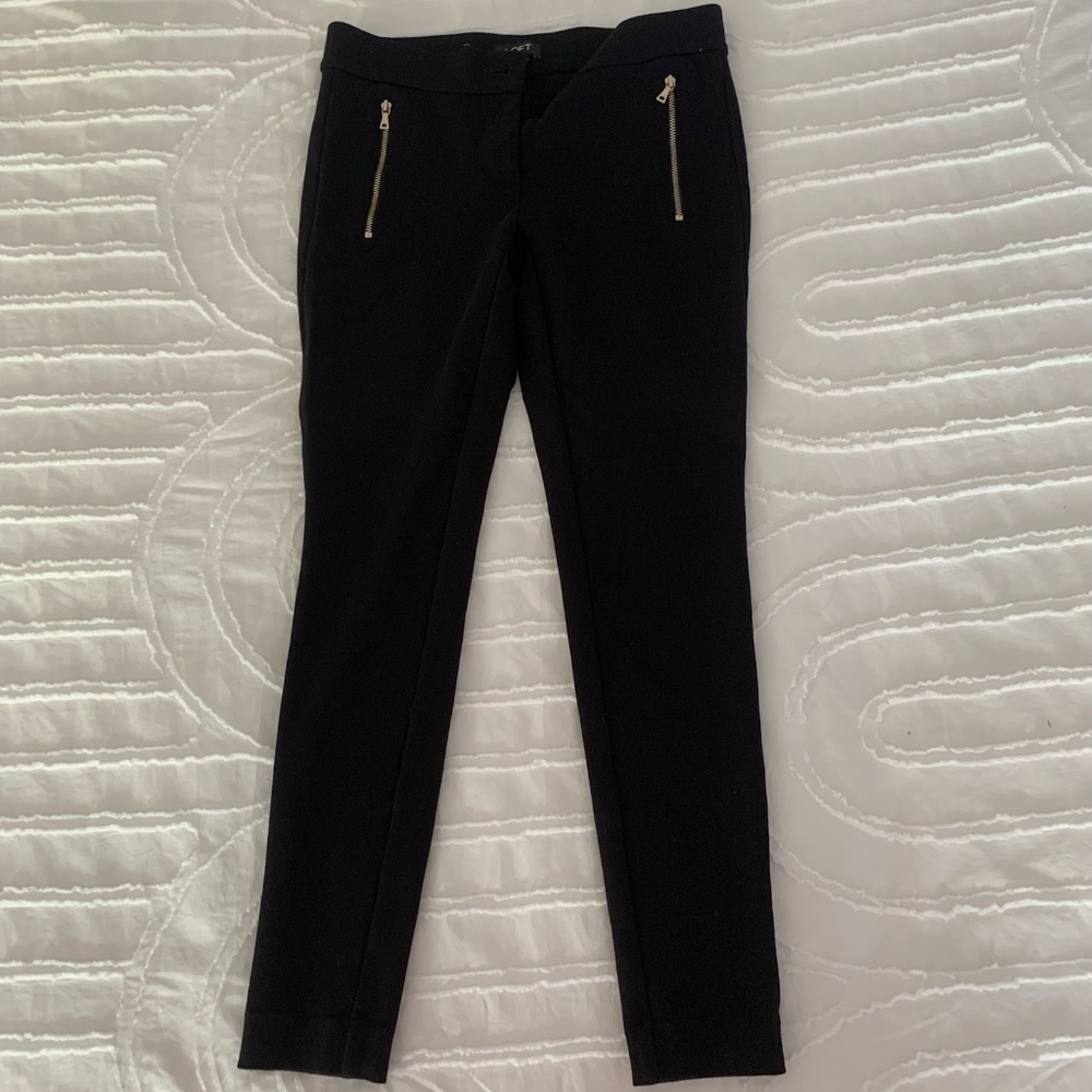 Skinny black trousers